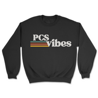 Black sweatshirt with 'PCS vibes' text on a white background