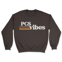 Brown sweatshirt with 'PCS vibes' text on a white background