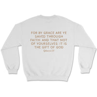 Light-colored sweatshirt with “Saved by Grace” text on front and full Ephesians 2:8 verse on back