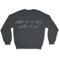 Dark heather sweatshirt featuring oversized “What If It All Works Out” typography on the back
